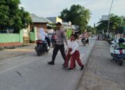 Personel Polsek Lambu Polres Bima Kota Laksanakan Rawan Pagi di Jalan Lintas Desa Sumi