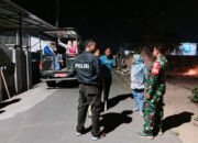 Bhabinkamtibmas Kelurahan Menala Dampingi Operasi Eliminasi Anjing Liar Guna Cegah Penyebaran Rabies