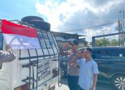 Kapolres Lombok Utara Gelar Bagikan Bendera Merah Putih di Jalan Raya