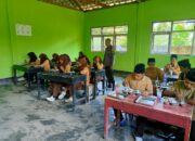 Bhabinkamtibmas Desa Mas-mas Polsek BKU Dampingi Pendistribusian Makanan Bergizi Gratis di Batukliang Utara