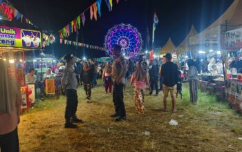 Polres Loteng Amankan Festival Pasar Malam Rona-Rona di Lapangan Peseng