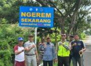 Sat Lantas Polres Dompu Amankan Kegiatan Masyarakat dan Pasang Papan Imbauan Kamseltibcarlantas