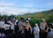 Bhabinkamtibmas Polsubsektor Palibelo Laksanakan Pengawalan dan Pengalaman Pawai Ta,Aruf di Desa Binaannya